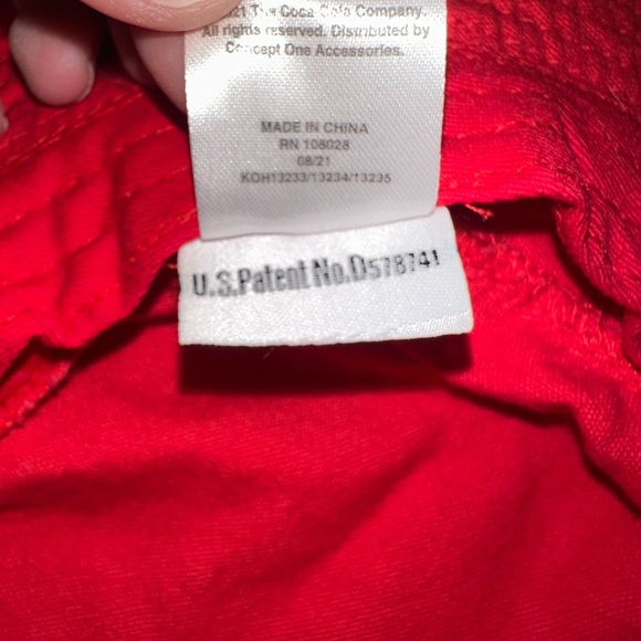 Coca-Cola bucket hat with a bottle opener attachment and an adjustable string - Picture 9 of 9